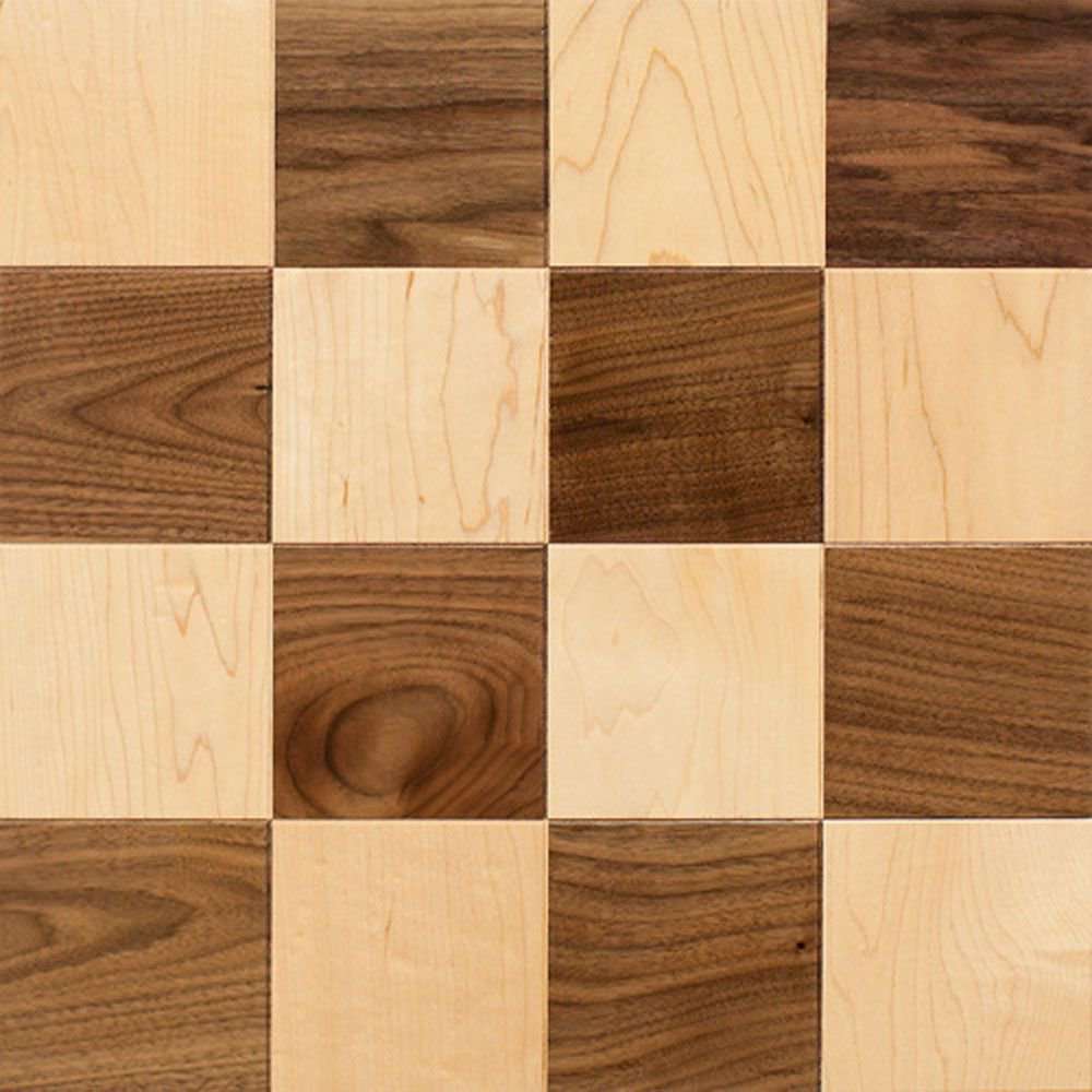High-contrast square parquet flooring featuring a checkerboard mix of light maple and dark walnut wood for a custom geometric design